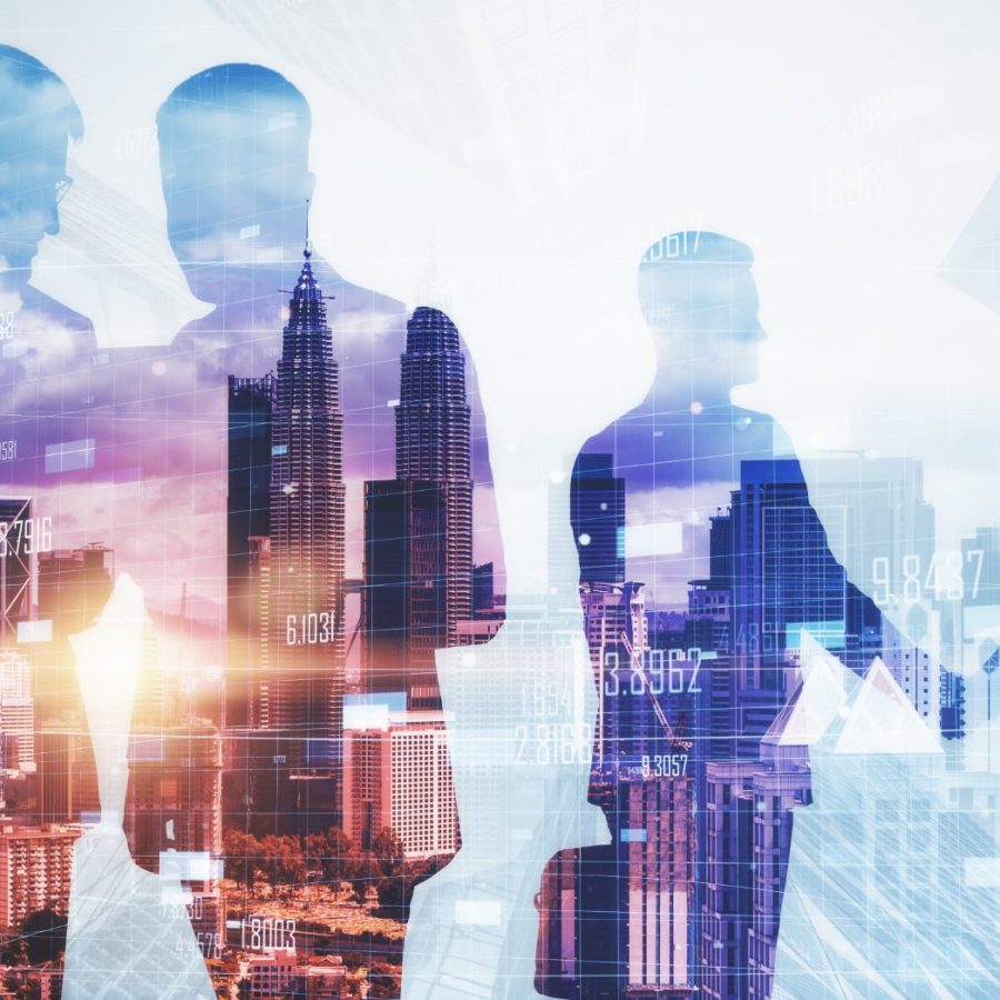 businessmen-silhouettes-working-together-on-blurry-2026-01-11-08-35-58-utc